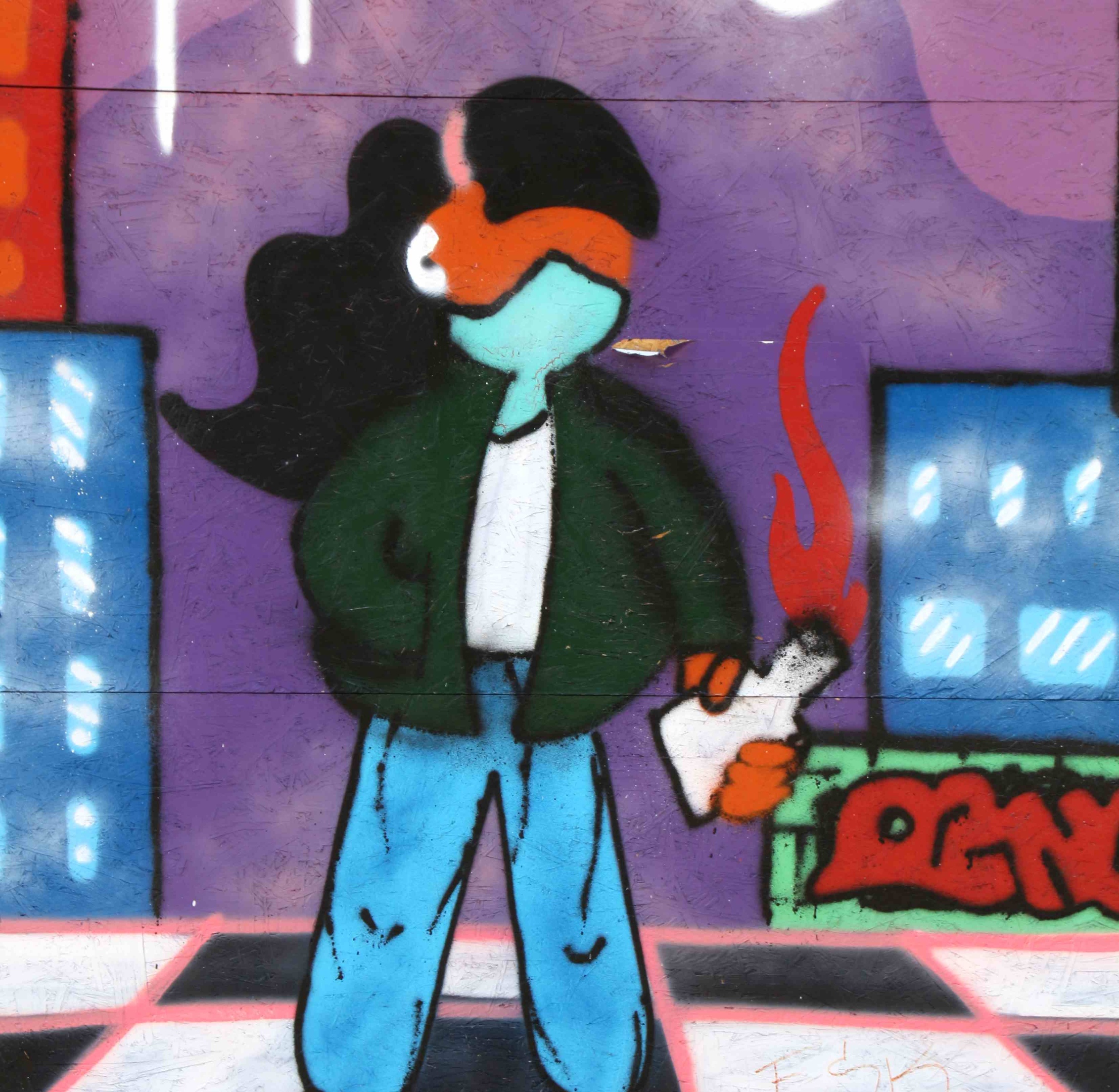 Graffiti, an eine Mauer gesprayt, zeigt ein Mädchen mit einem Brennsatz in der Hand