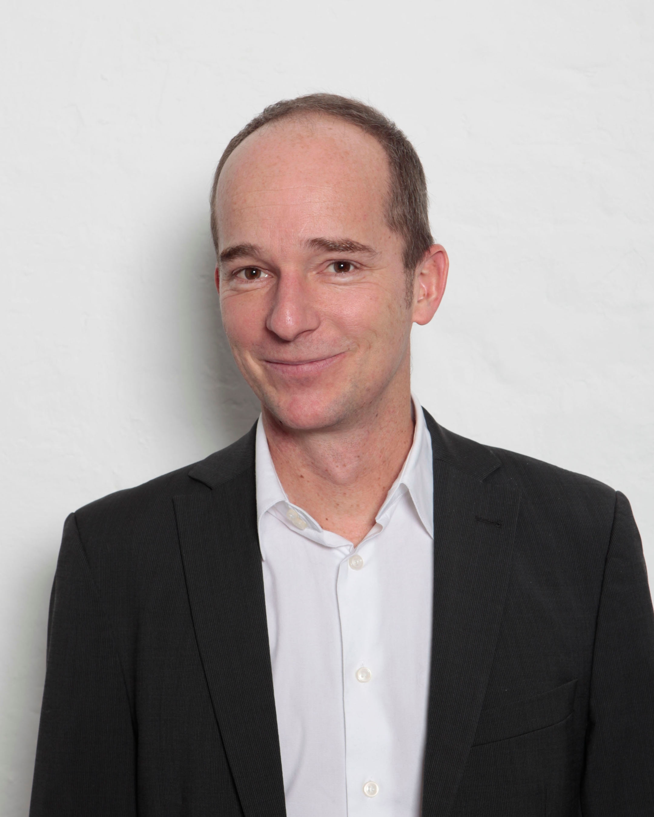 Porträt eines Mannes, es zeigt den Autor Timo Daum